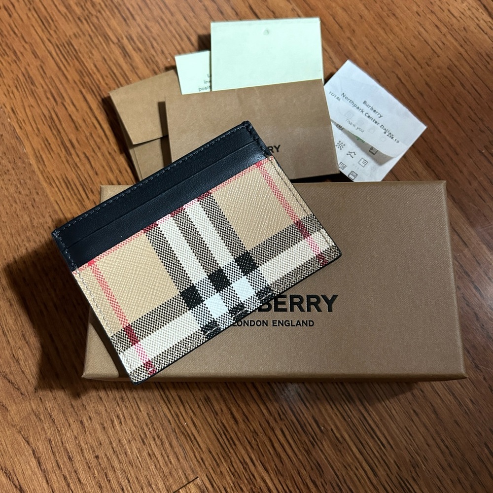 - Authentic Burberry Card Holder. Brand new in box and receipt of purchase.